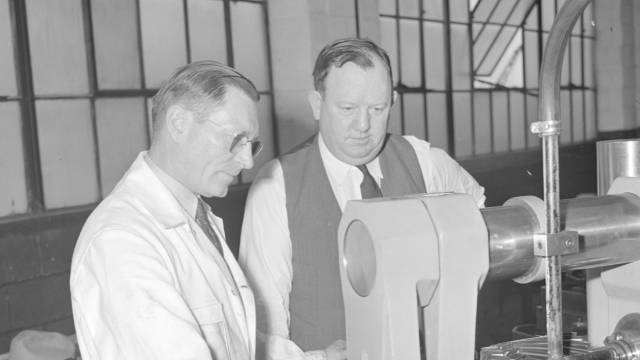 Homer E. Capehart with Packard employee